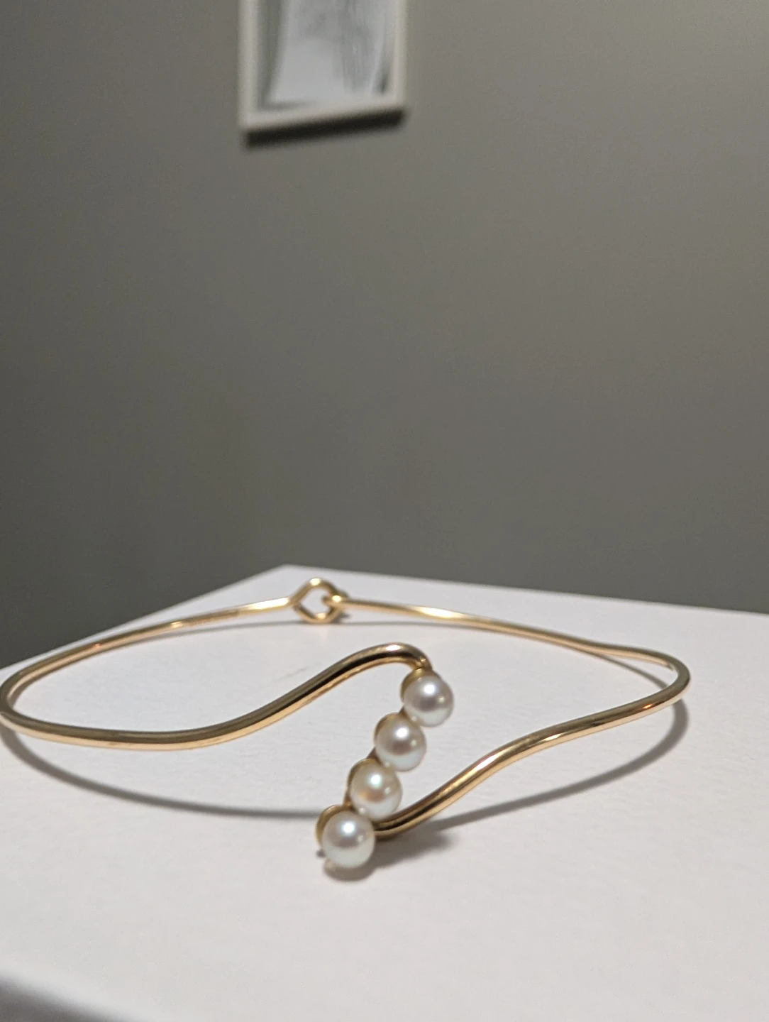 Gold Tone Wave Bangle with Pearls