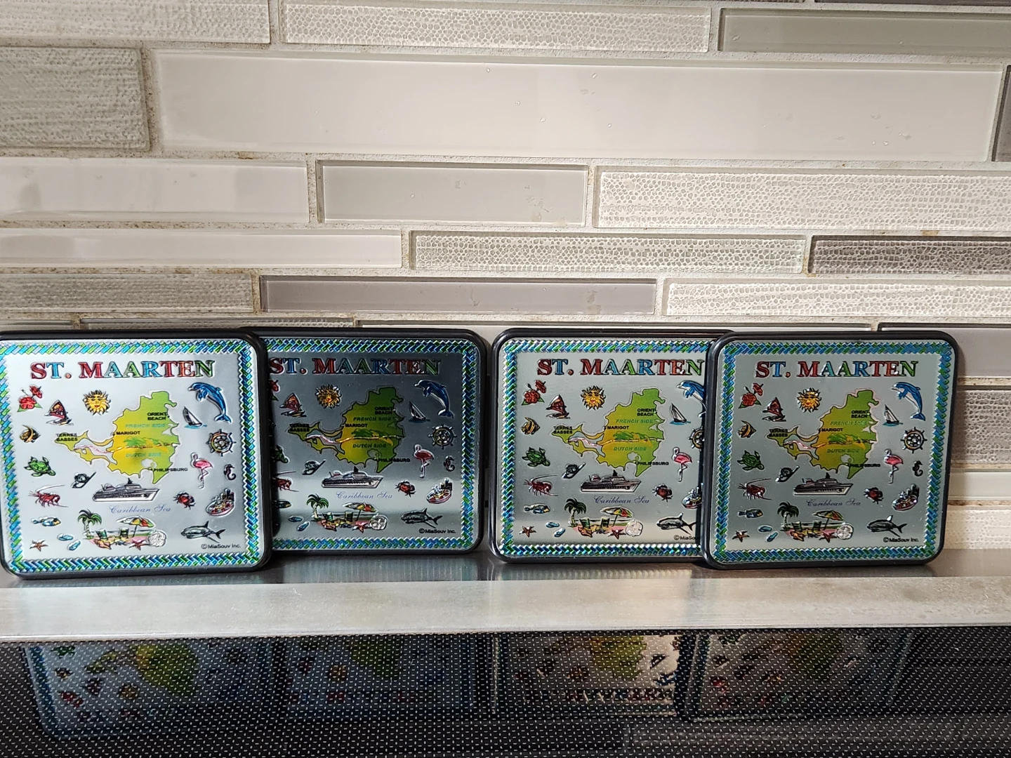 Set of 4 St. Maarten souvenir tins