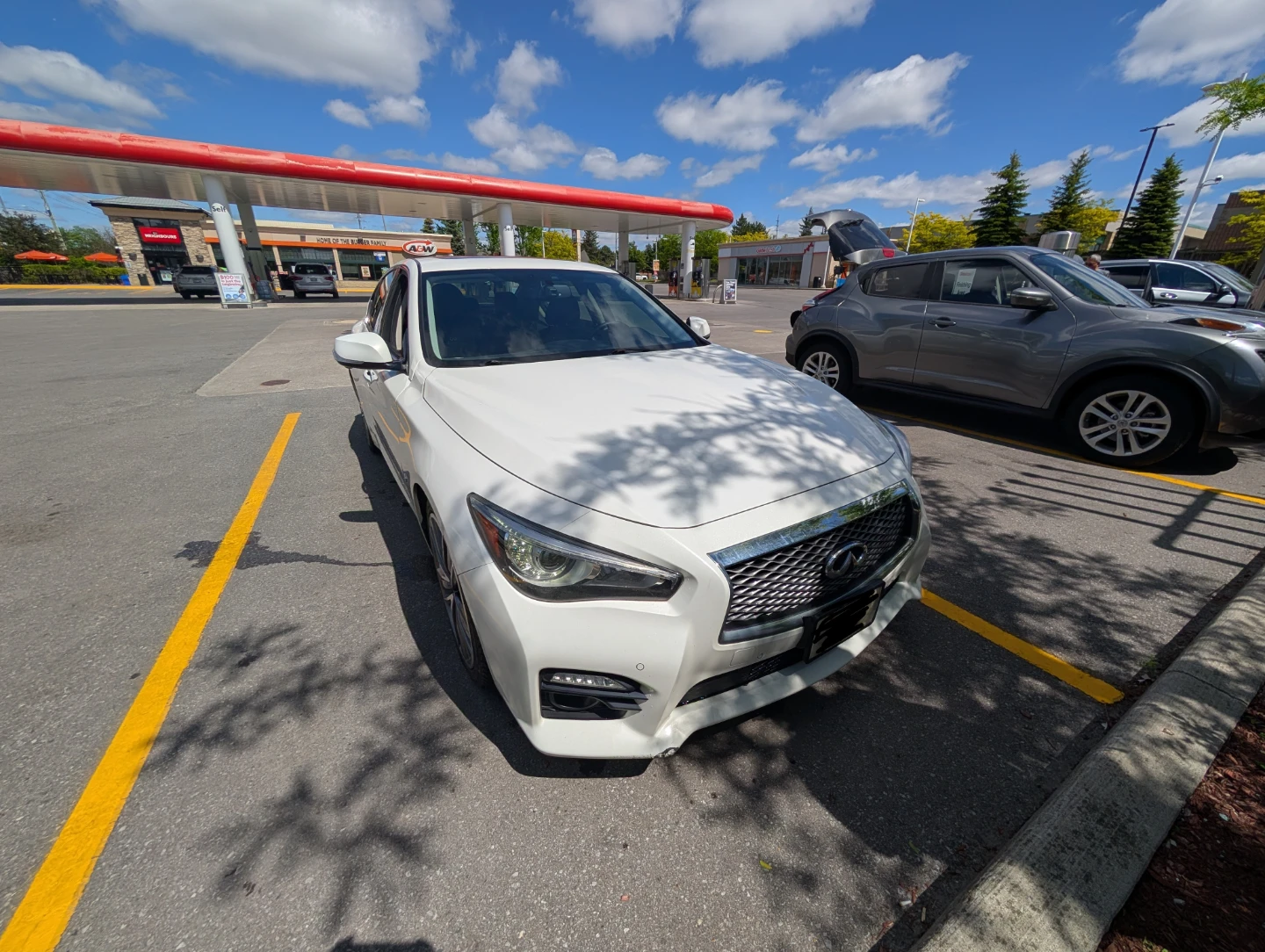 White Infiniti Q50S Sedan