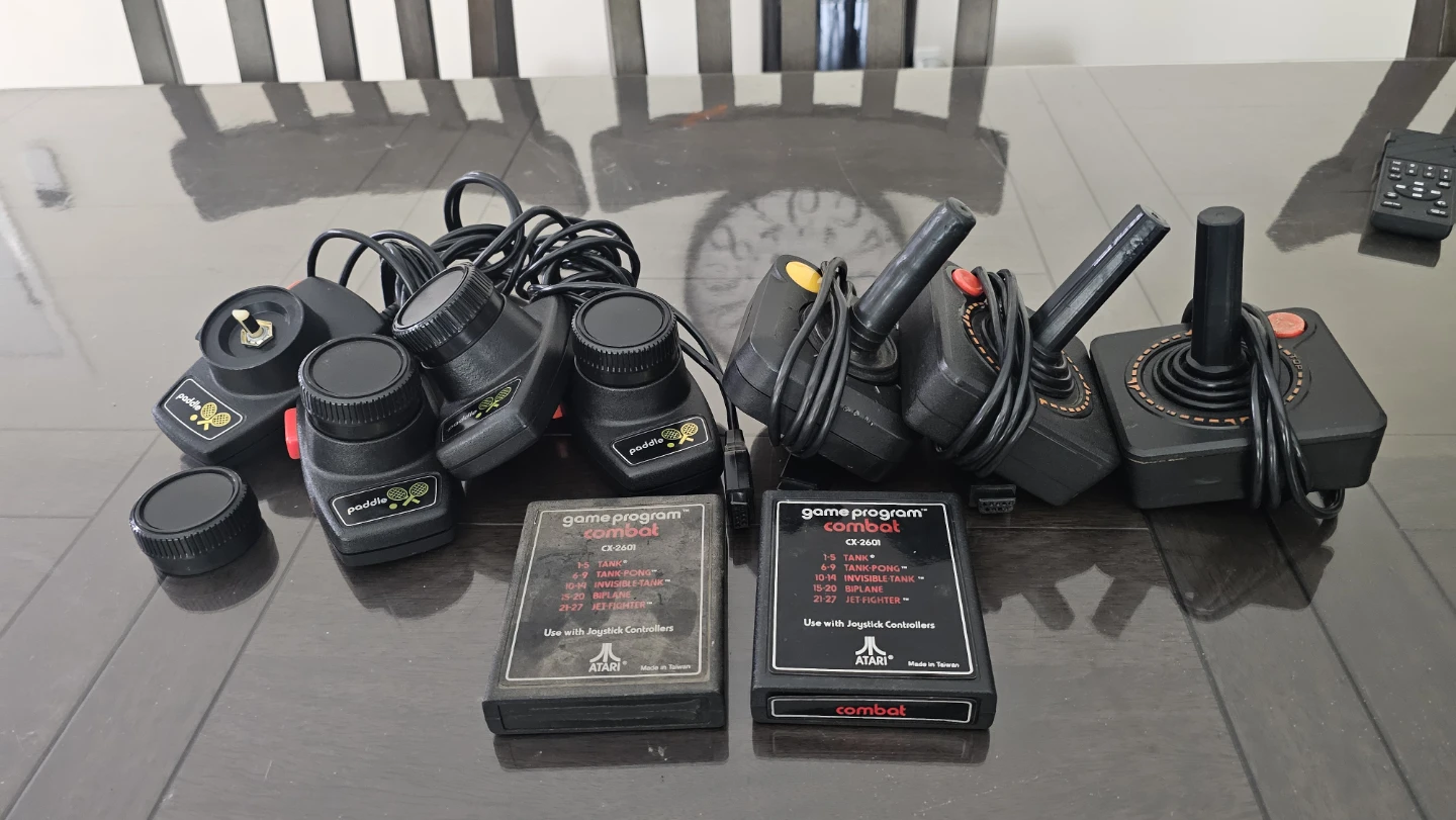 Atari Joysticks, Paddle Controllers & Combat Game Cartridges