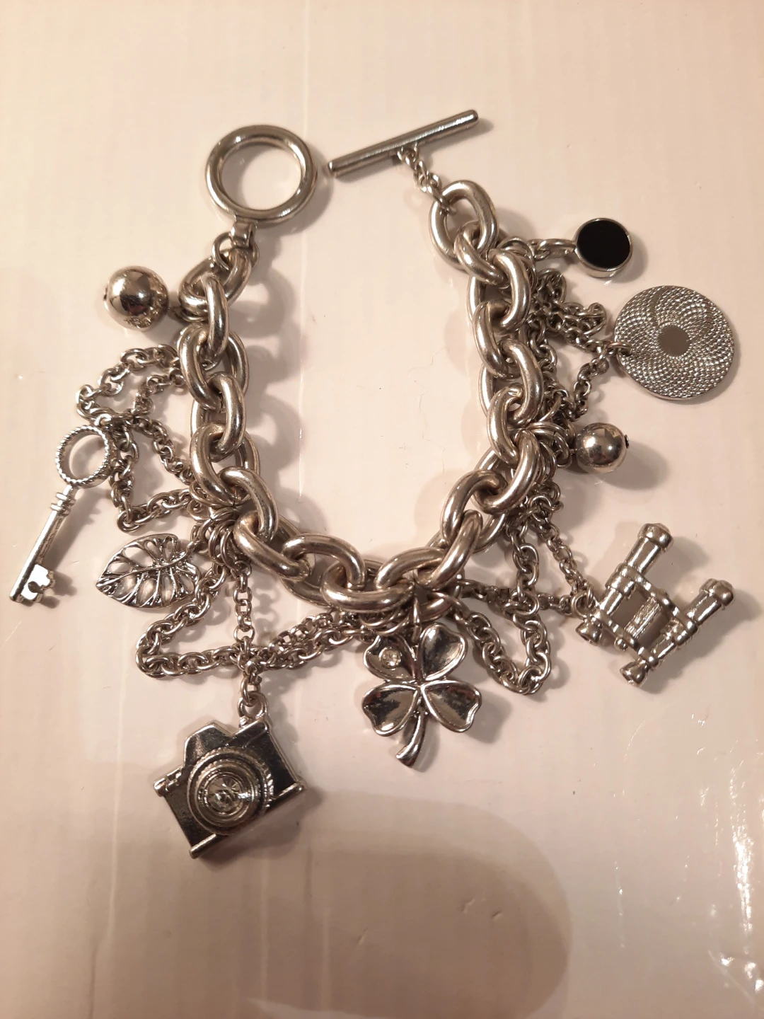 Silver Charm Bracelet with Camera, Clover, Key and Cannon Charms