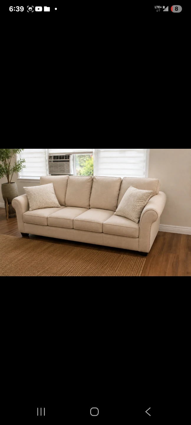 Beige Sofa with Accent Pillows
