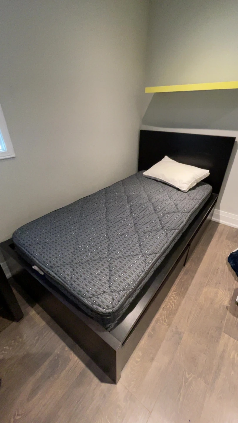 Twin Mattress with Black Bed Frame