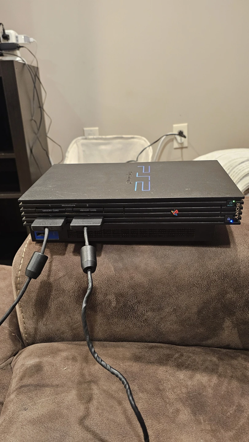 Sony PlayStation 2 Console with Games and Controllers