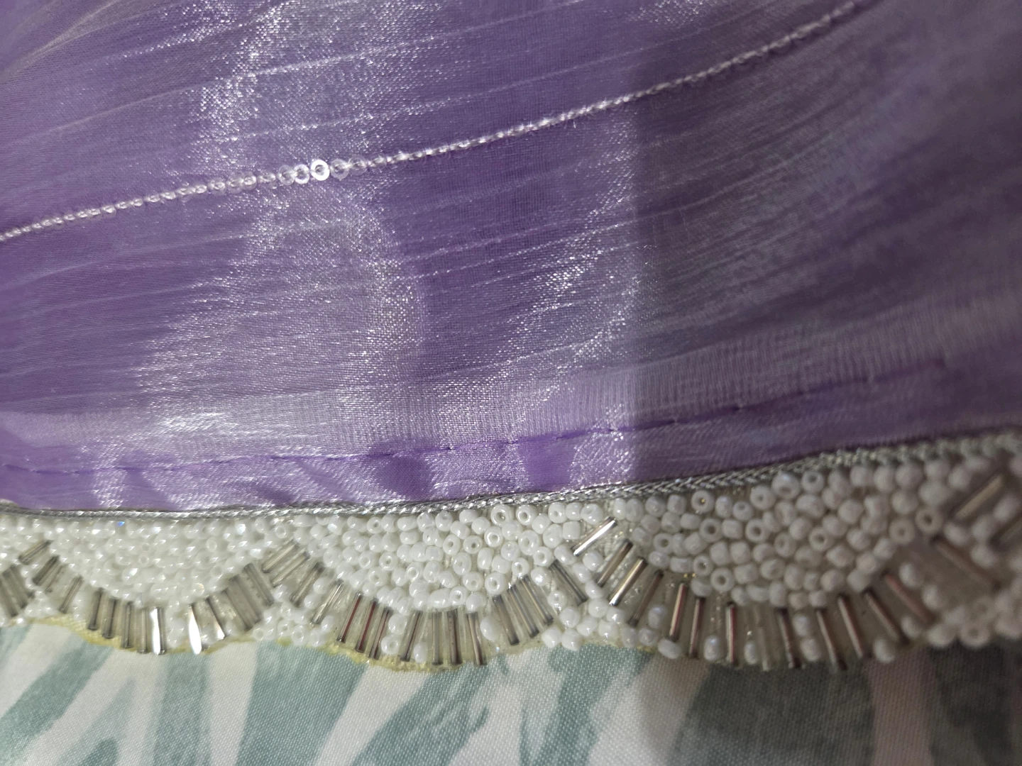 Purple Beaded saree with silver blouse
