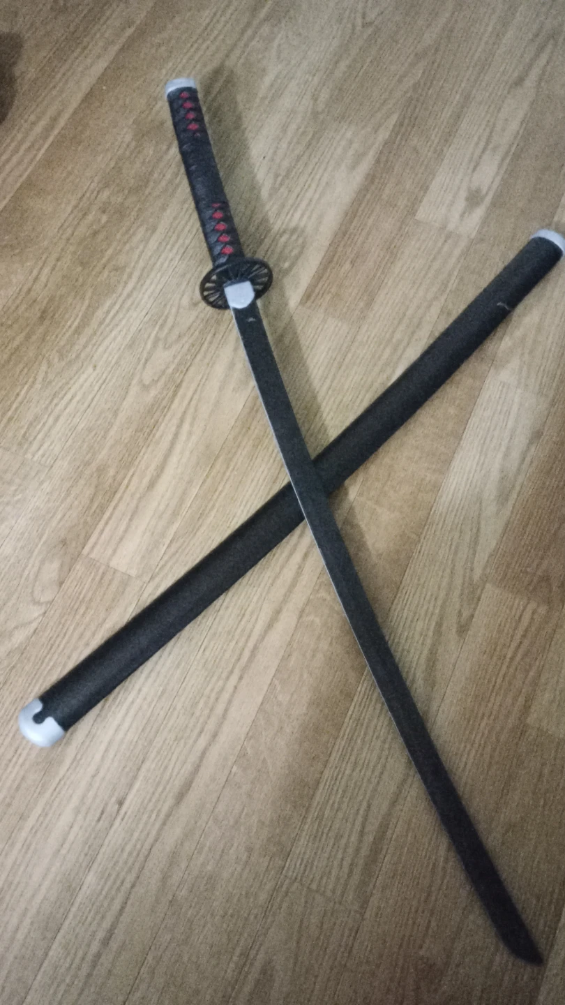 Black steel katana with red handle and sheath 🗡️