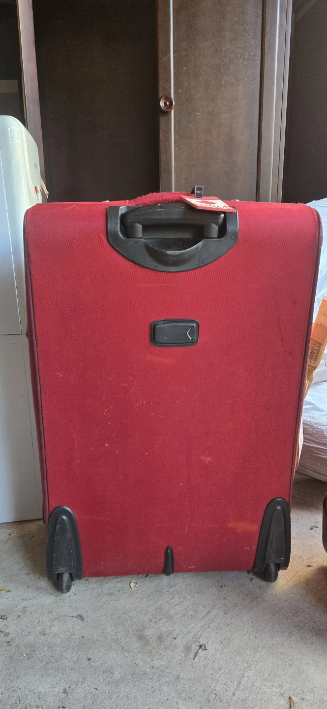 Red Softside Spinner Luggage