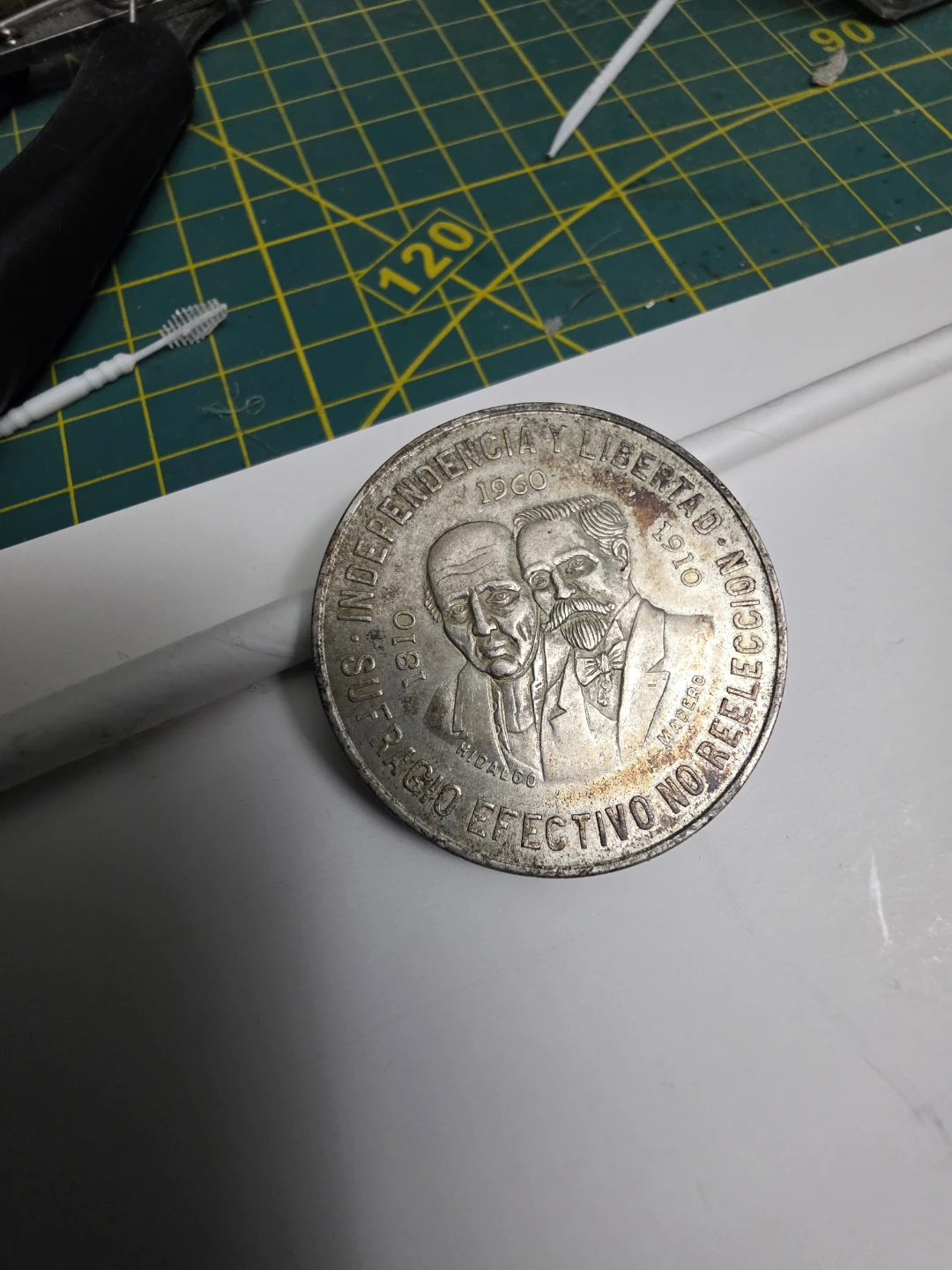 1960 silver 10 peso coin.