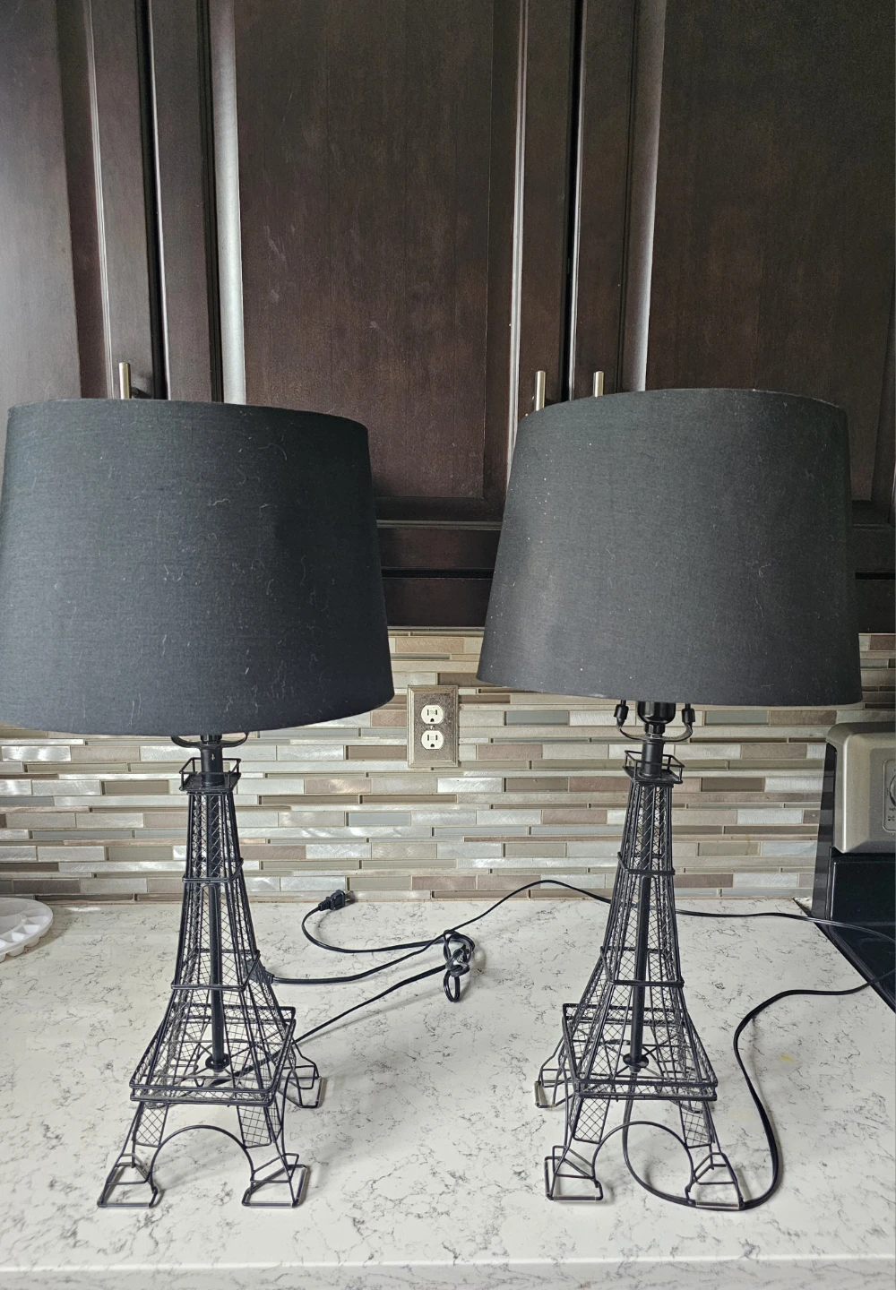 Multiple items, sold as a set.  Wall art and Eiffel Tower lamps.