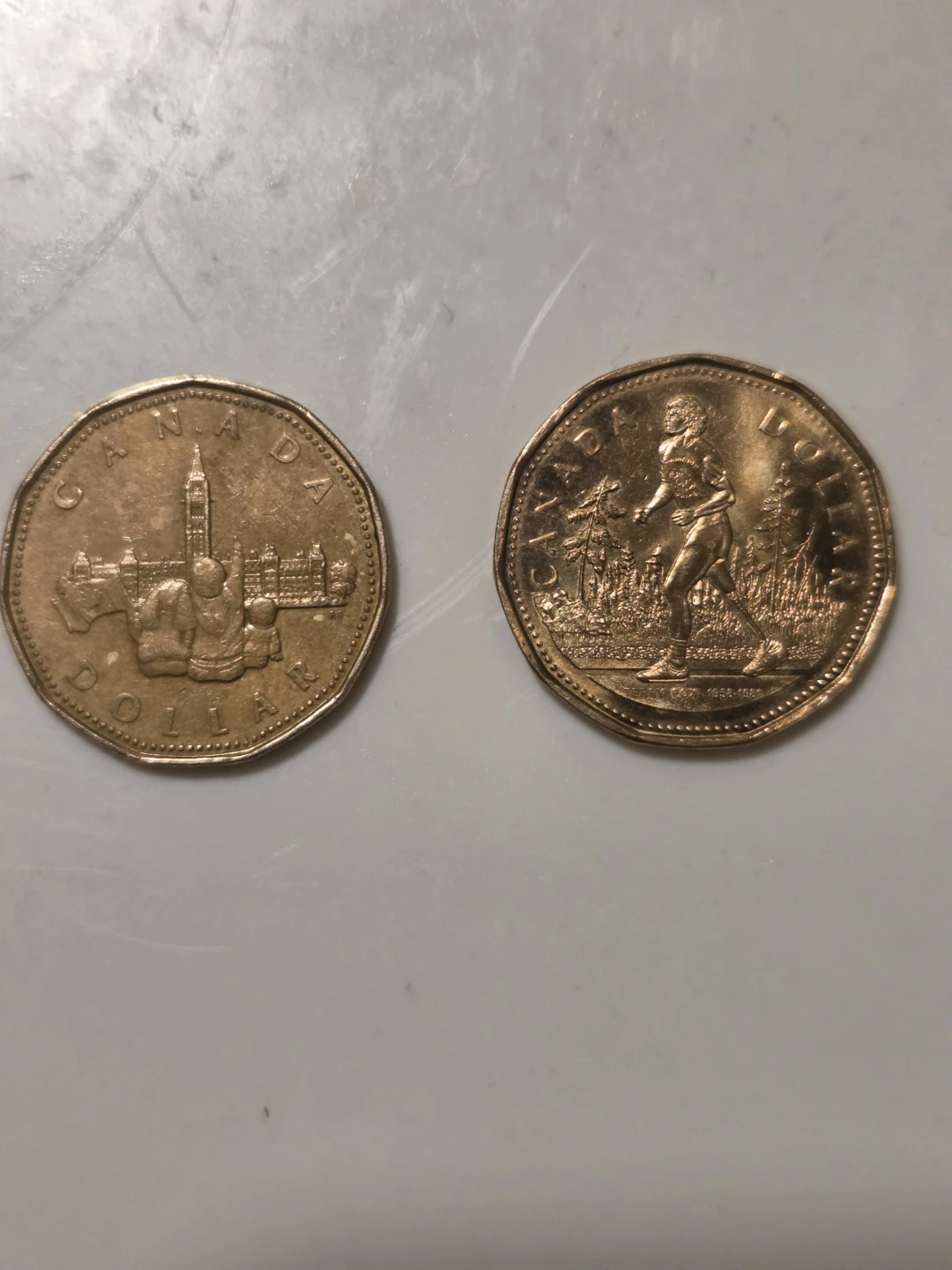 Canadian Dollar Coins - Loonies and Toonies