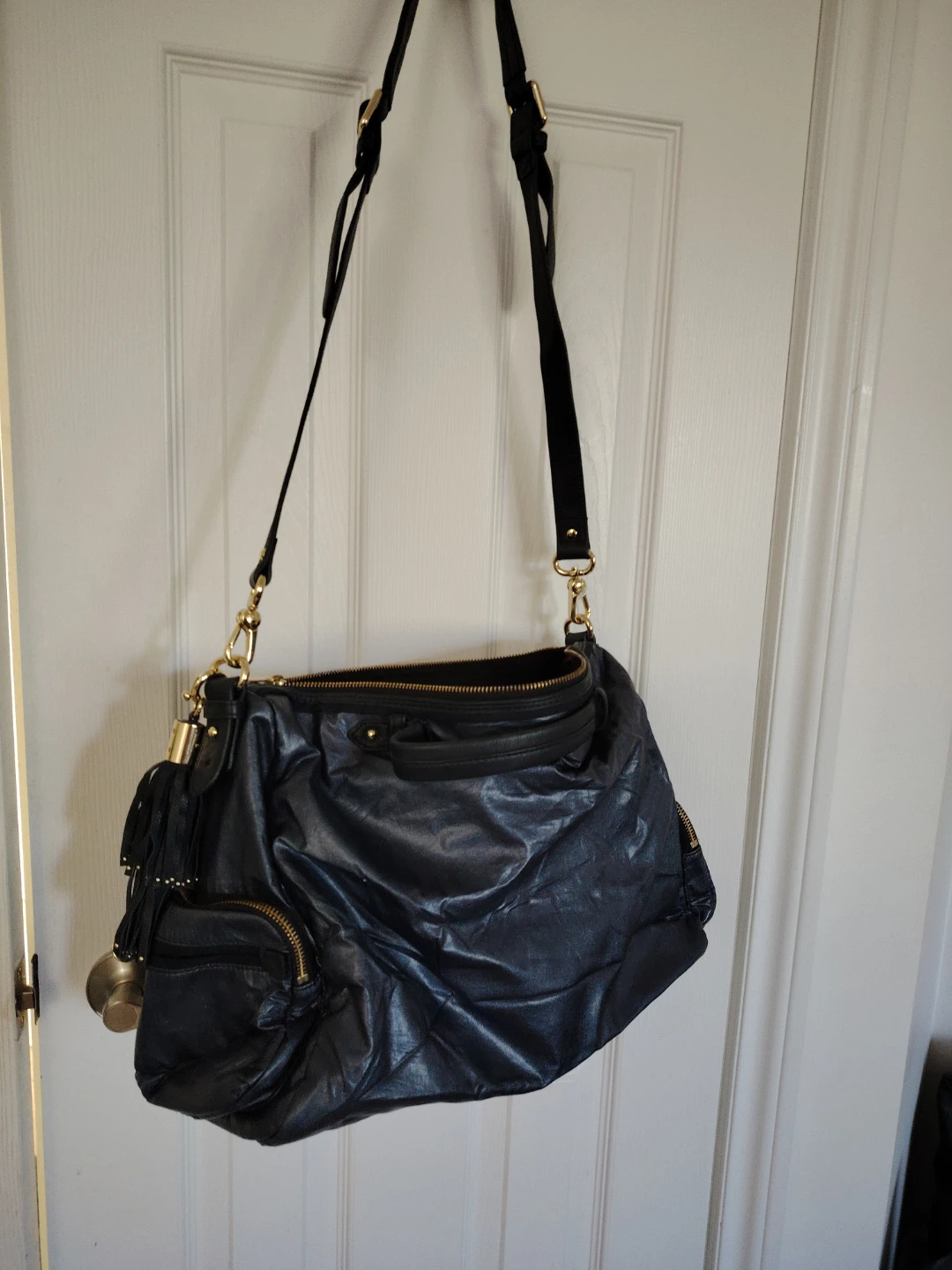 Juicy Couture Black Leather Handbag with Tassel Charm - photo 4