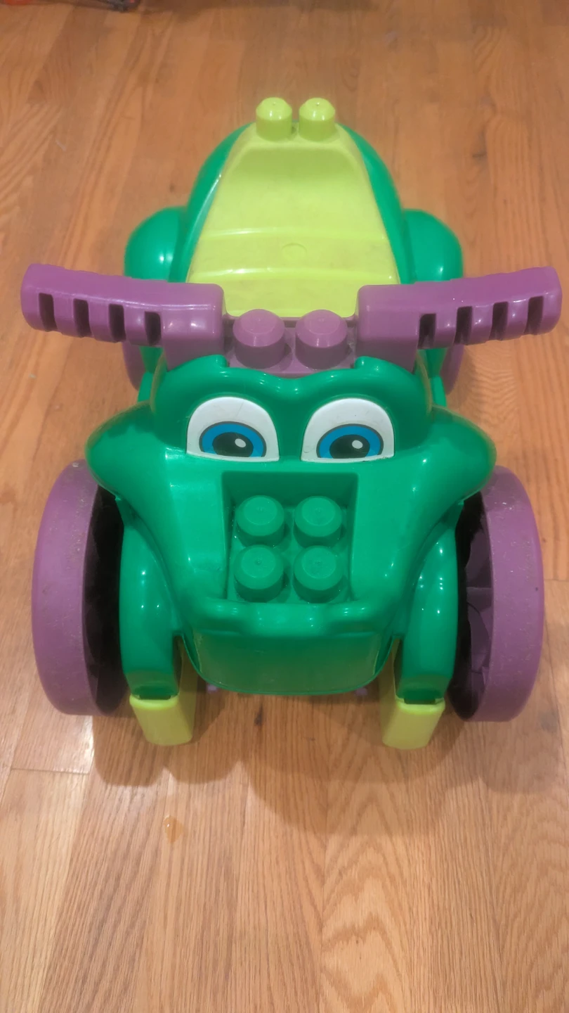 Megablocks Green Ride-On Toy with blocks and Storage Compartment