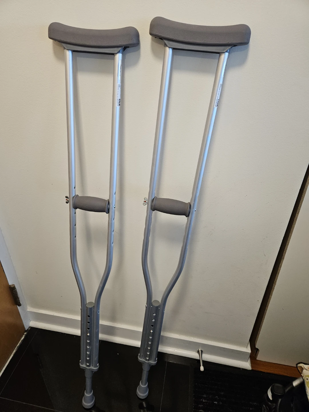 Adjustable crutches