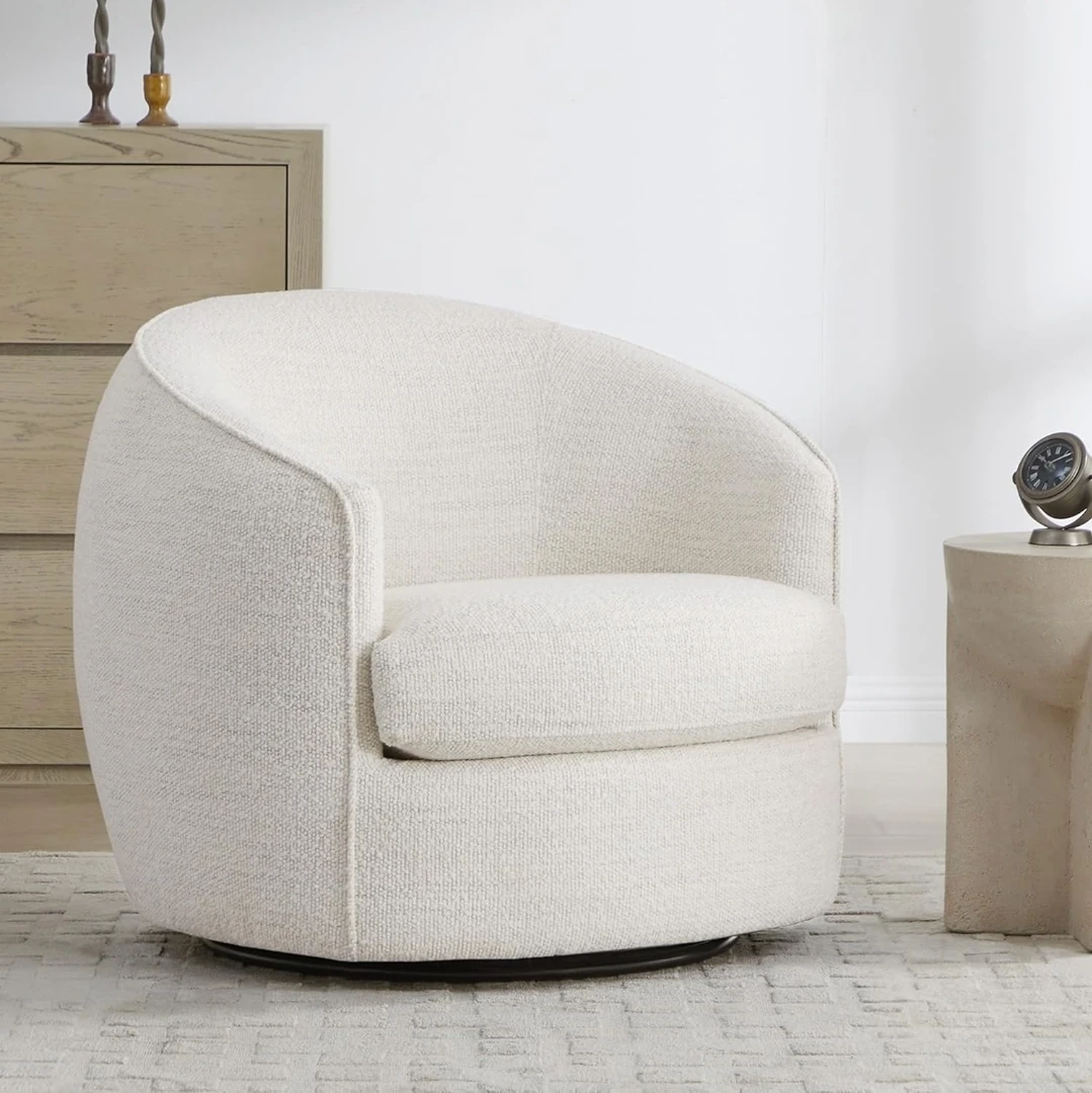 Cream Upholstered Swivel Armchair