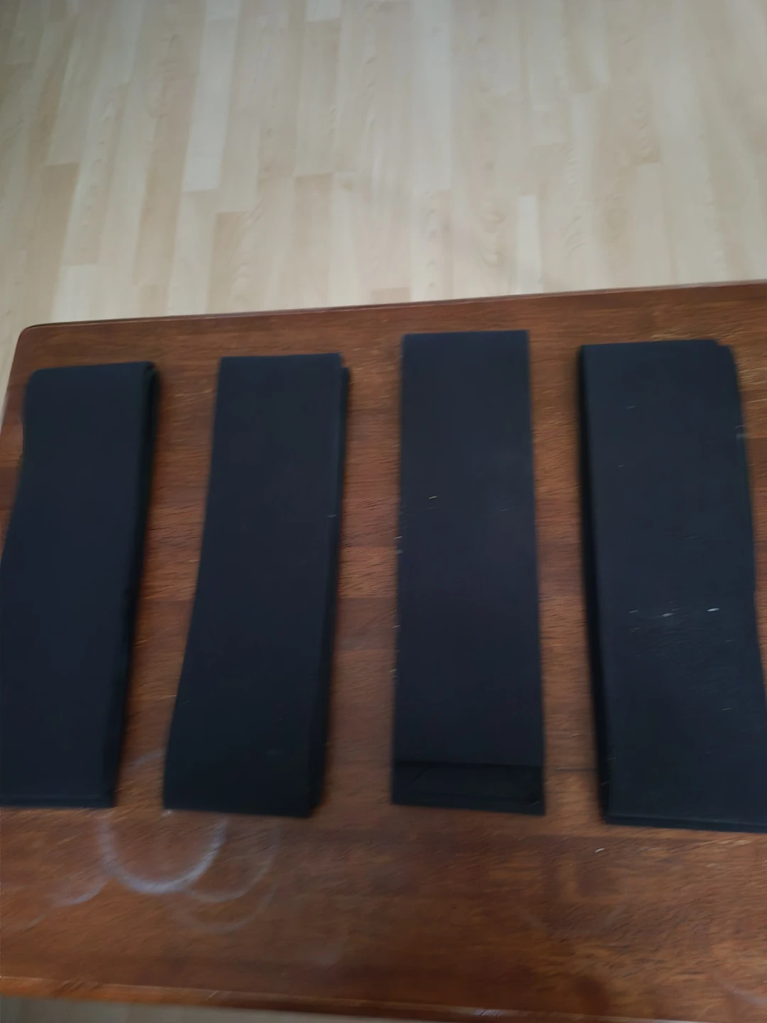 Table straps for stretch therapy