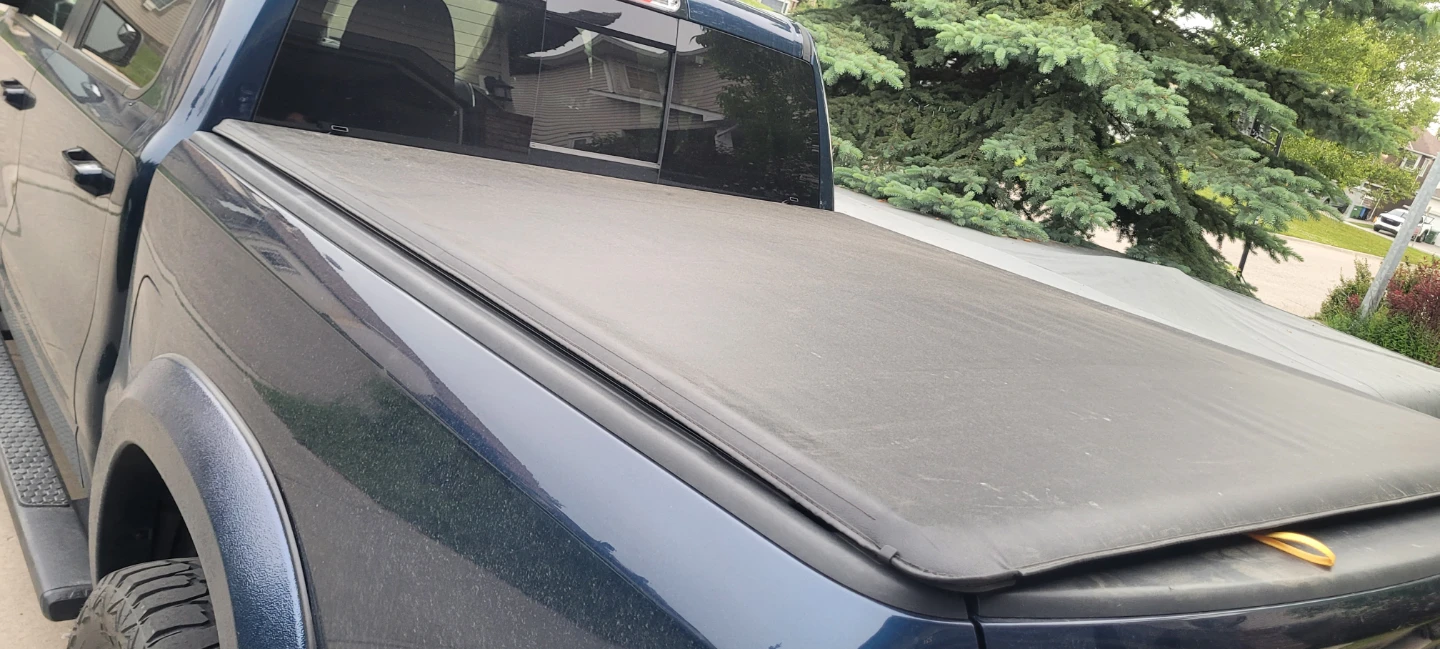 Truck bed cover roll up