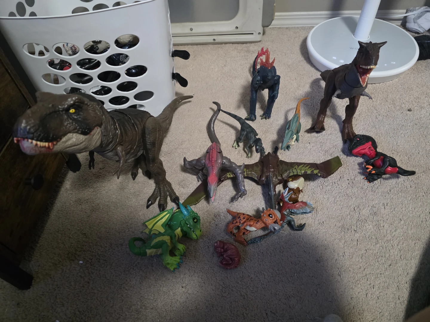 Assorted Toy Cars, Figures, and Dinosaurs