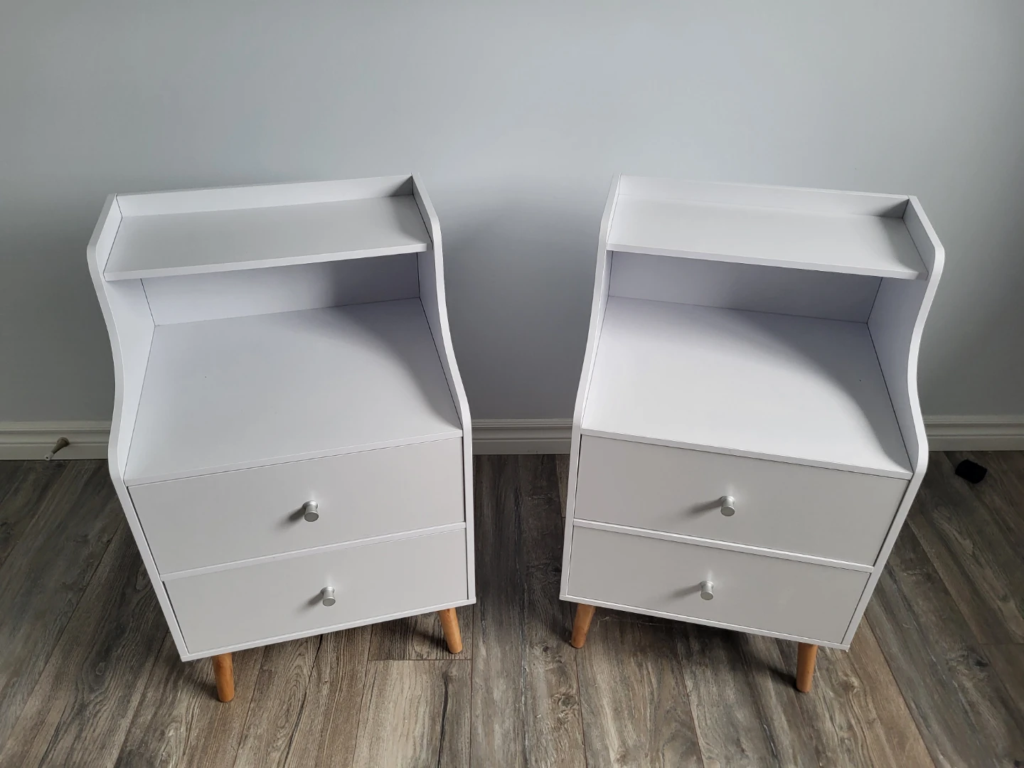 Two white bedside tables