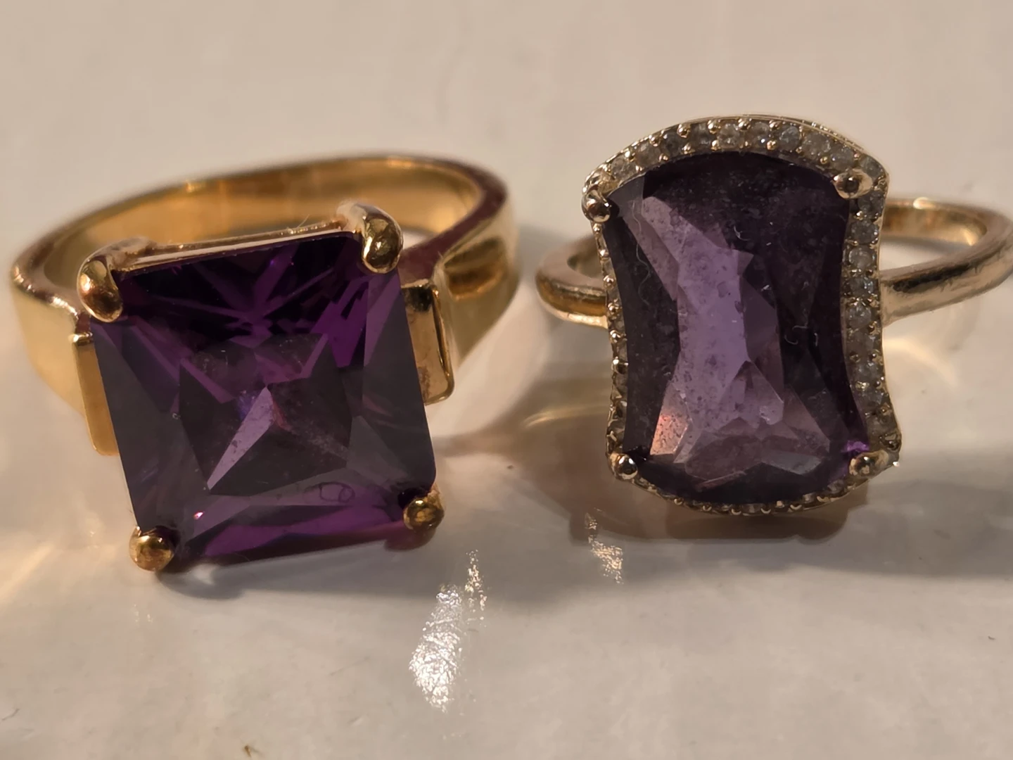 Two purple stones rings