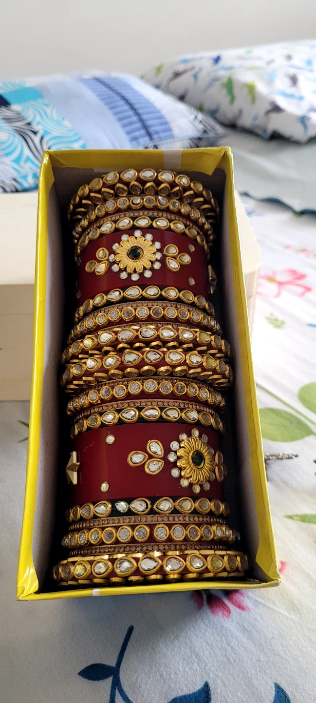 Traditional Red Bangles with Gold and Crystal Embellishments