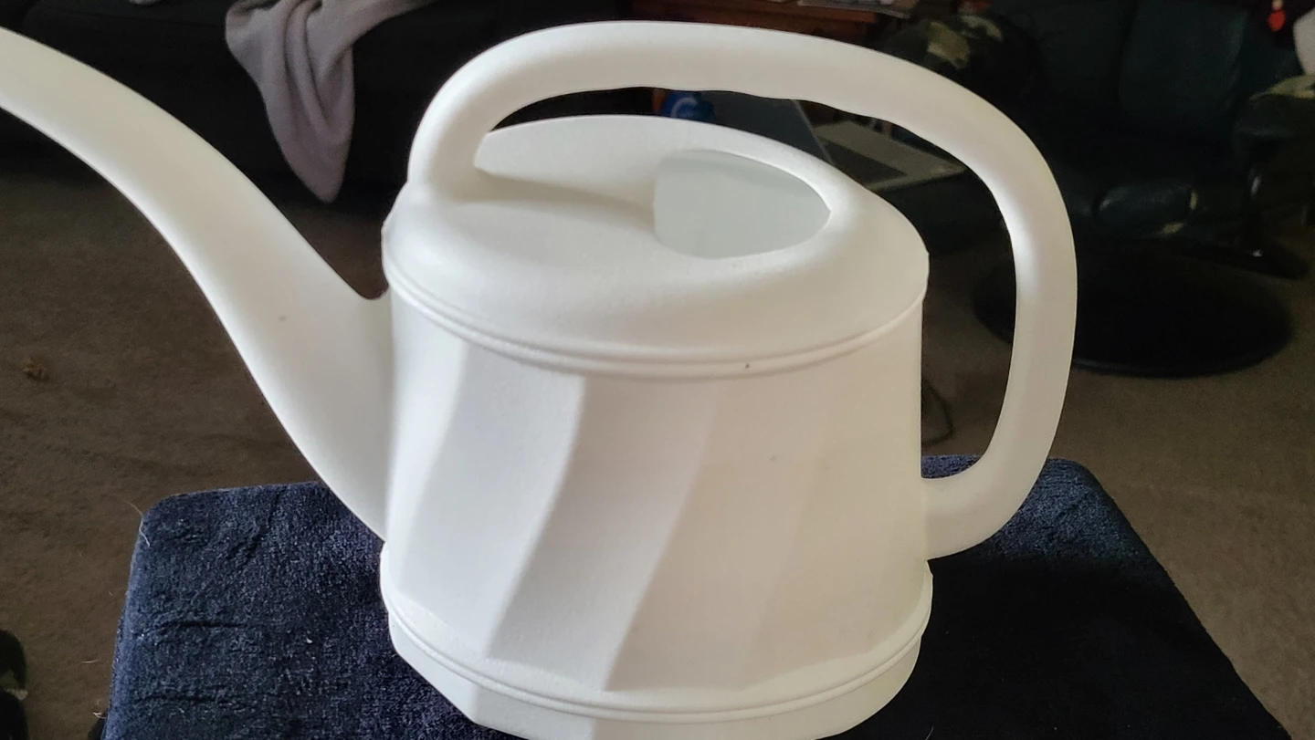 White Plastic Watering Can