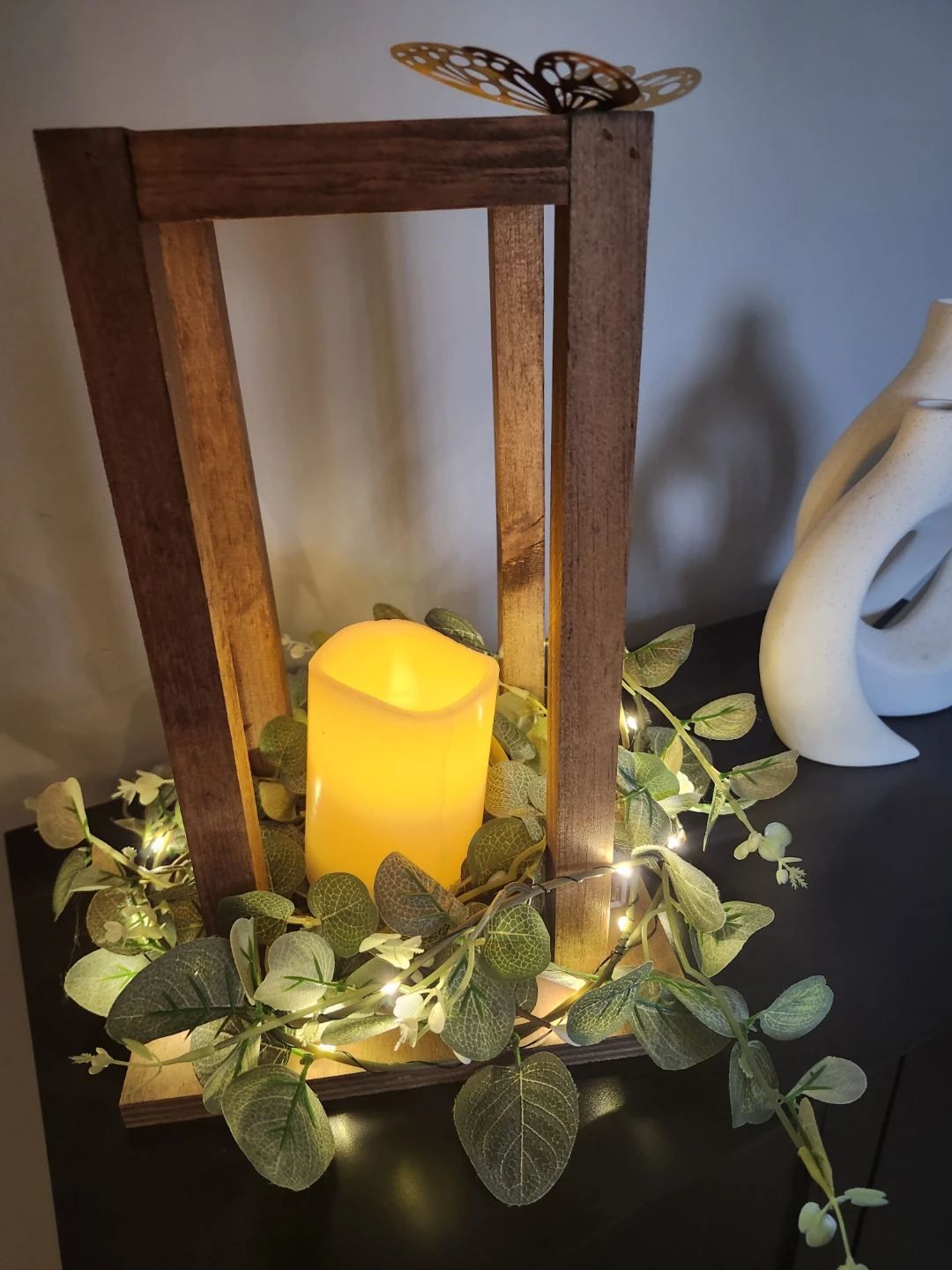 Lantern centrepieces with LED Candle and Greenery
