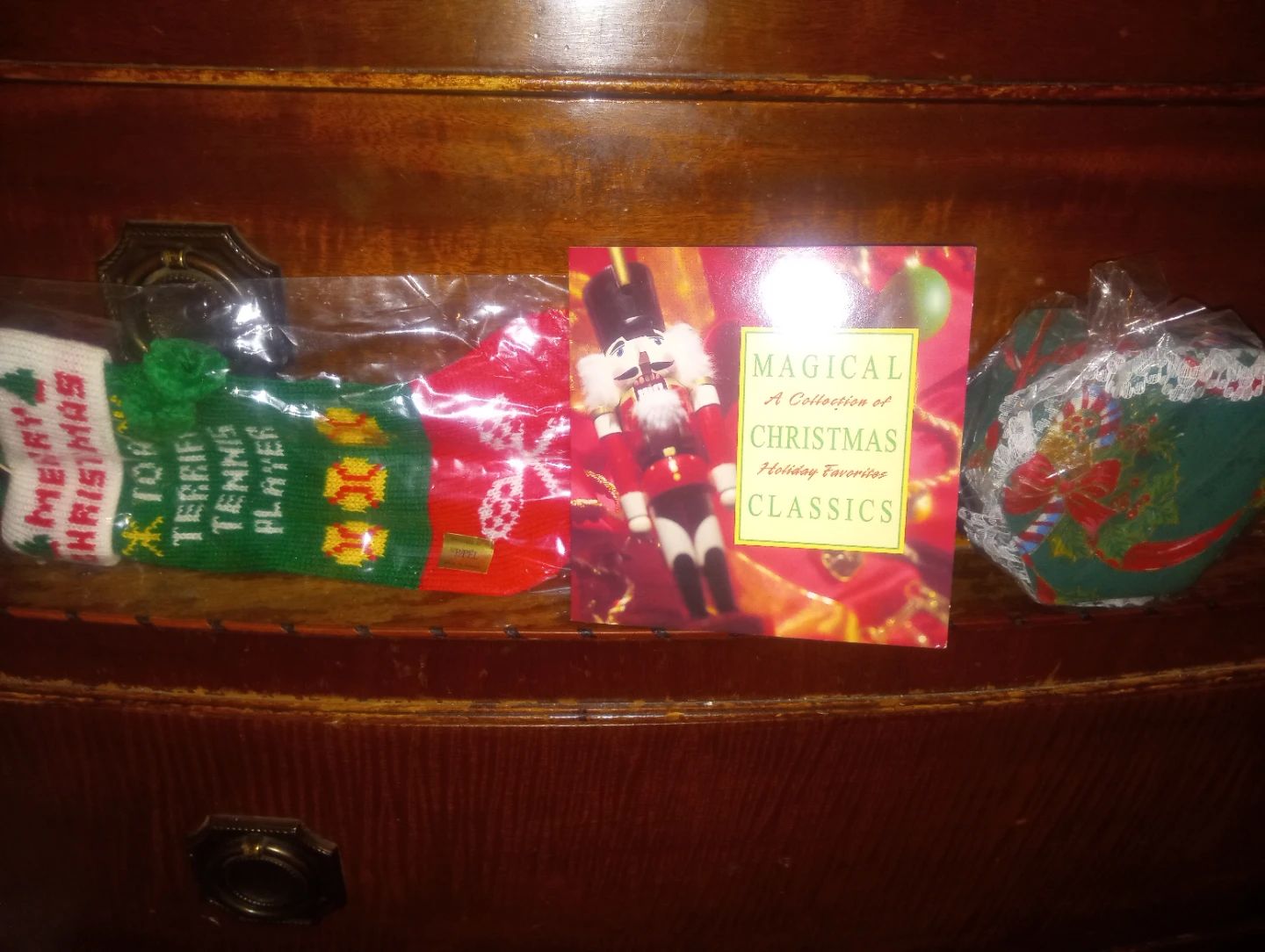 Christmas Items: CD, Stocking & Gift.
