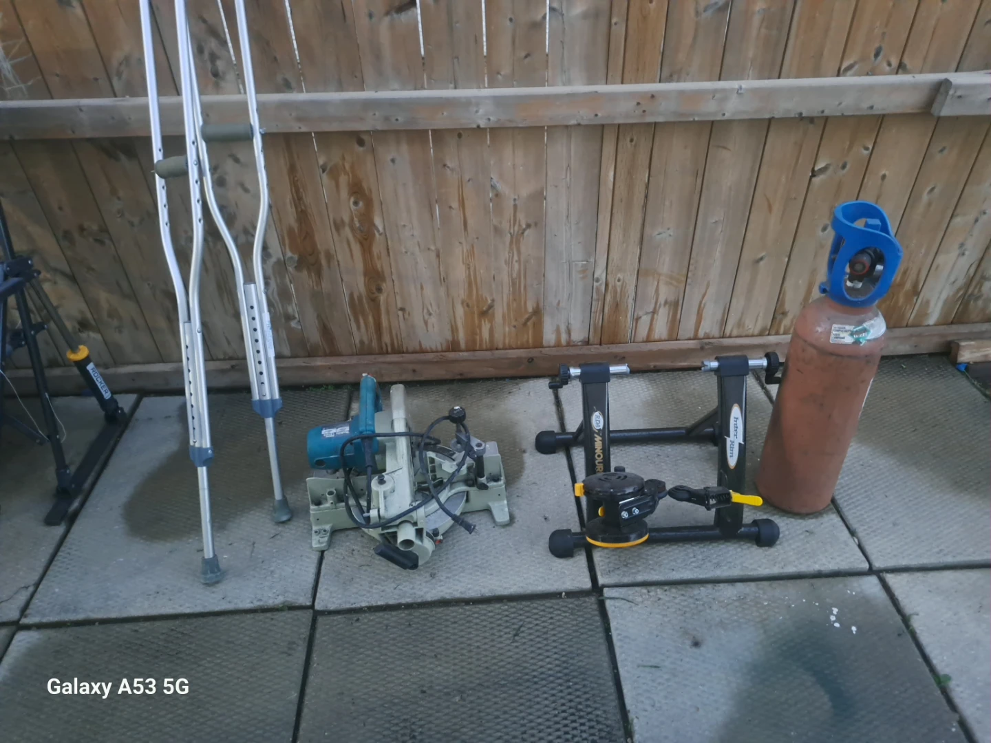 Miter Saw, Crutches, Bike Trainer, and Propane Tank