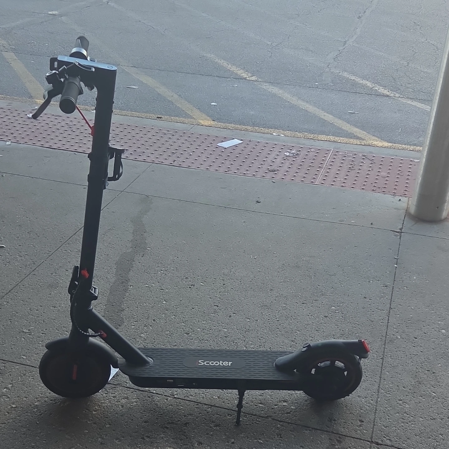Black and red electric scooter it goes 19 mph and its for kids