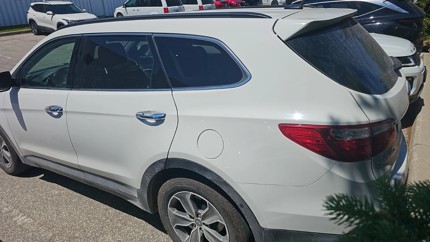 White Hyundai Santa Fe SUV - photo 2