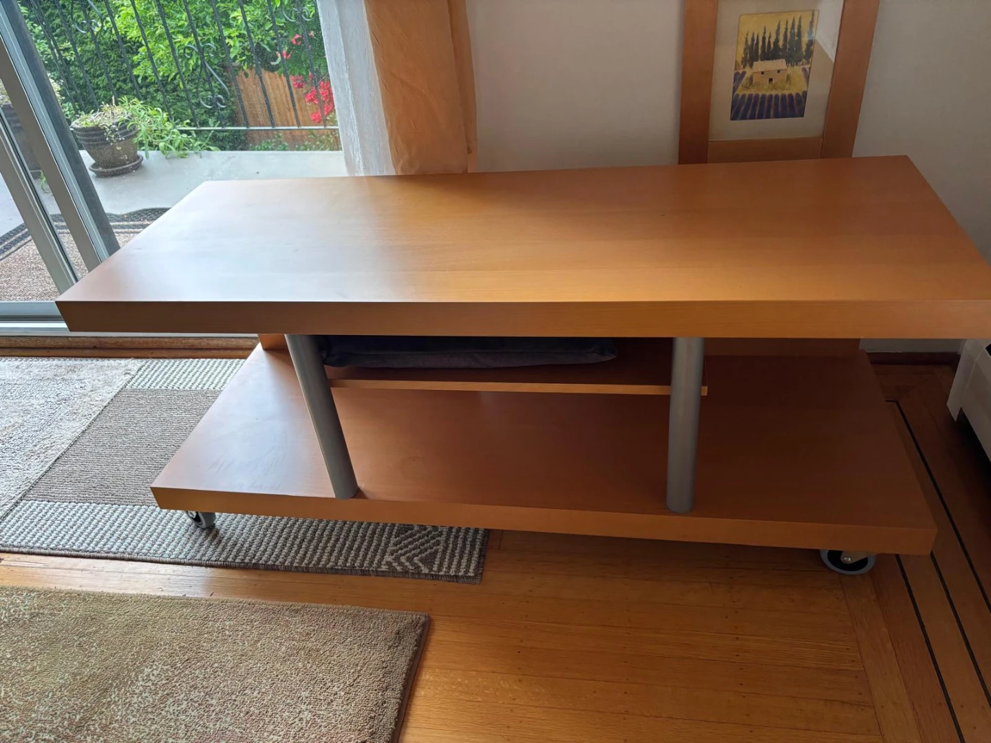 Wooden media console with wheels