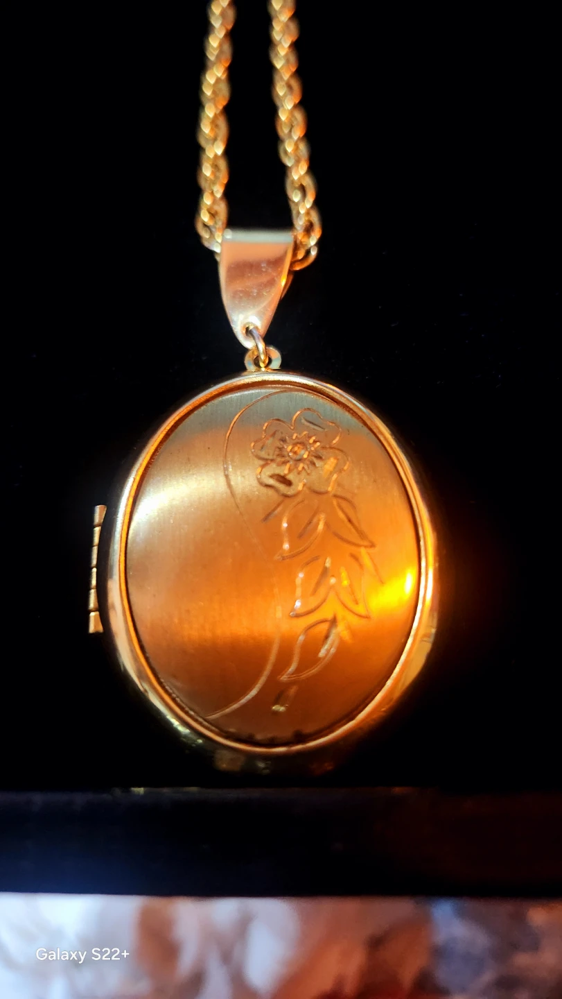 Vintage gold toned locket on its original gold chain