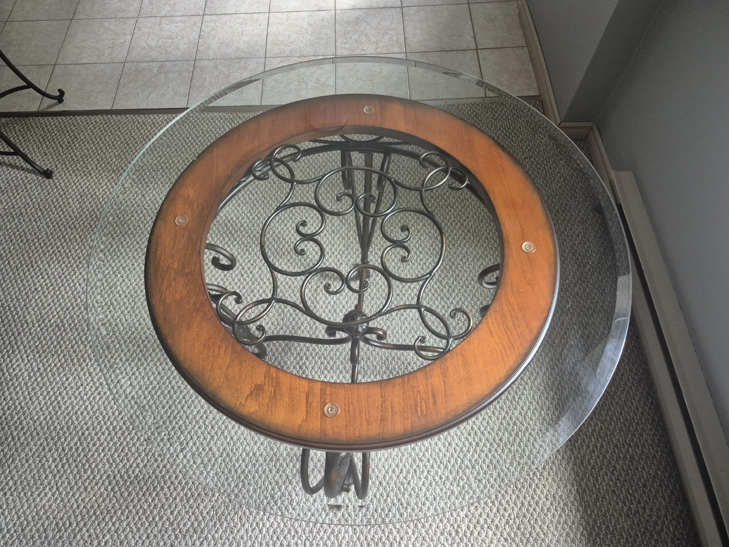 Round Glass Top Dining Table with Ornate Metal Base