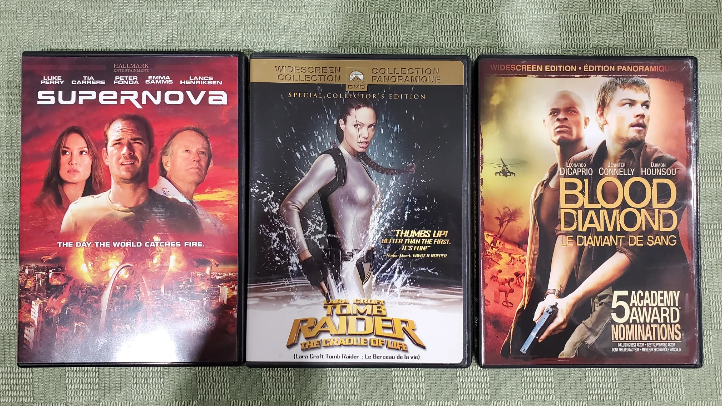 Supernova, Lara Croft Tomb Raider, and Blood Diamond DVDs