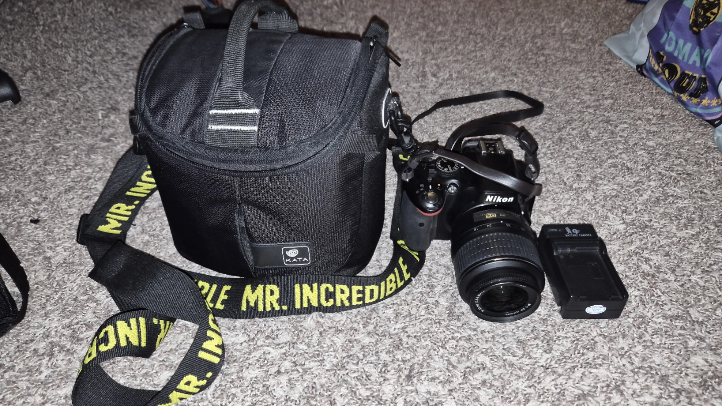 Nikon D5100 DSLR Camera with Bag and Accessories