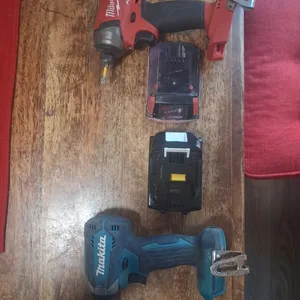 Milwaukee & Makita Impact Drivers with Batteries