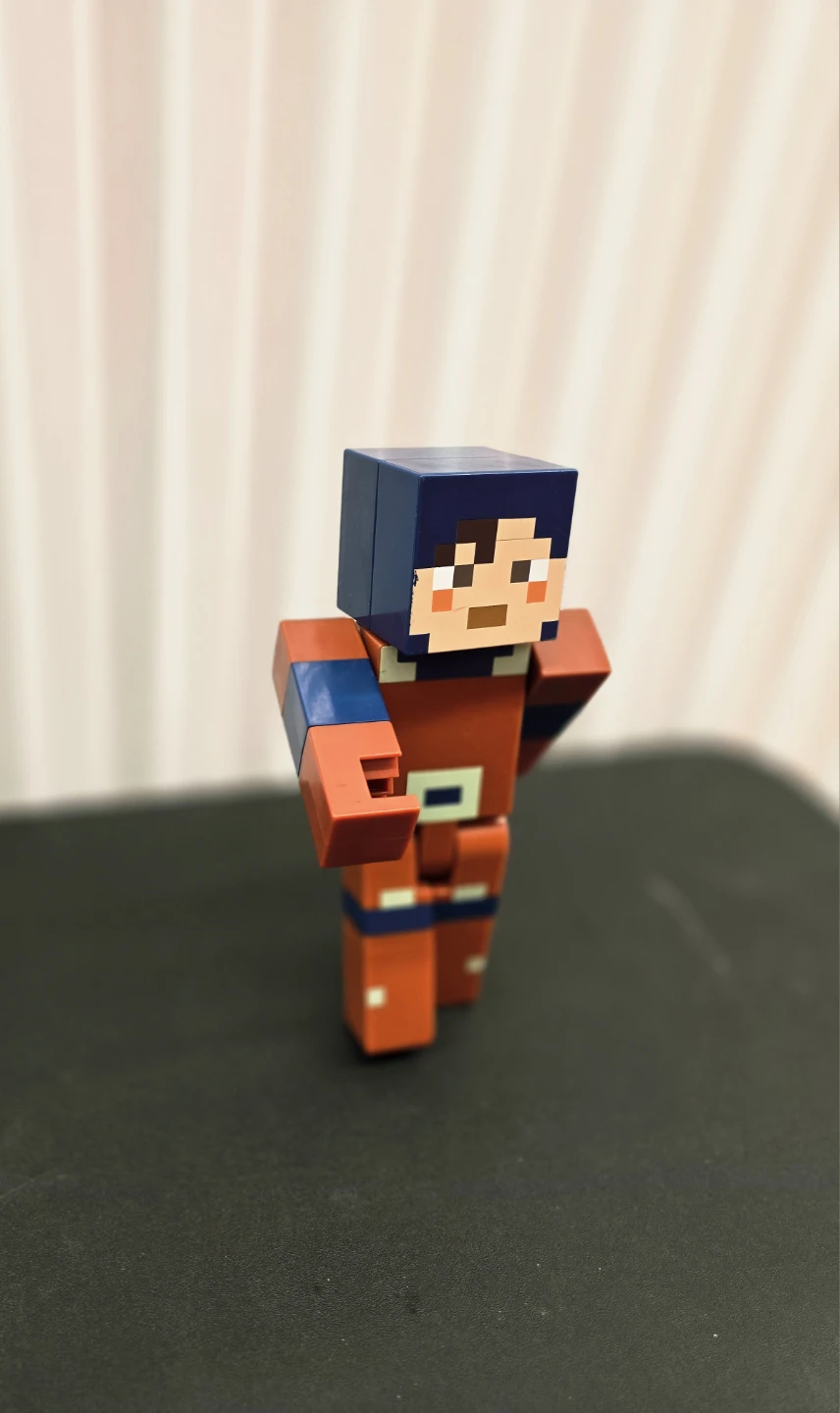 Pixelated Action Figure Toy