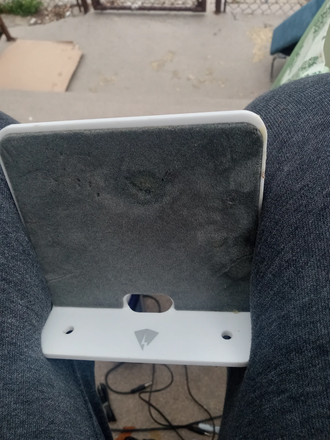 White Smartphone Stand with Lightning Bolt Logo
