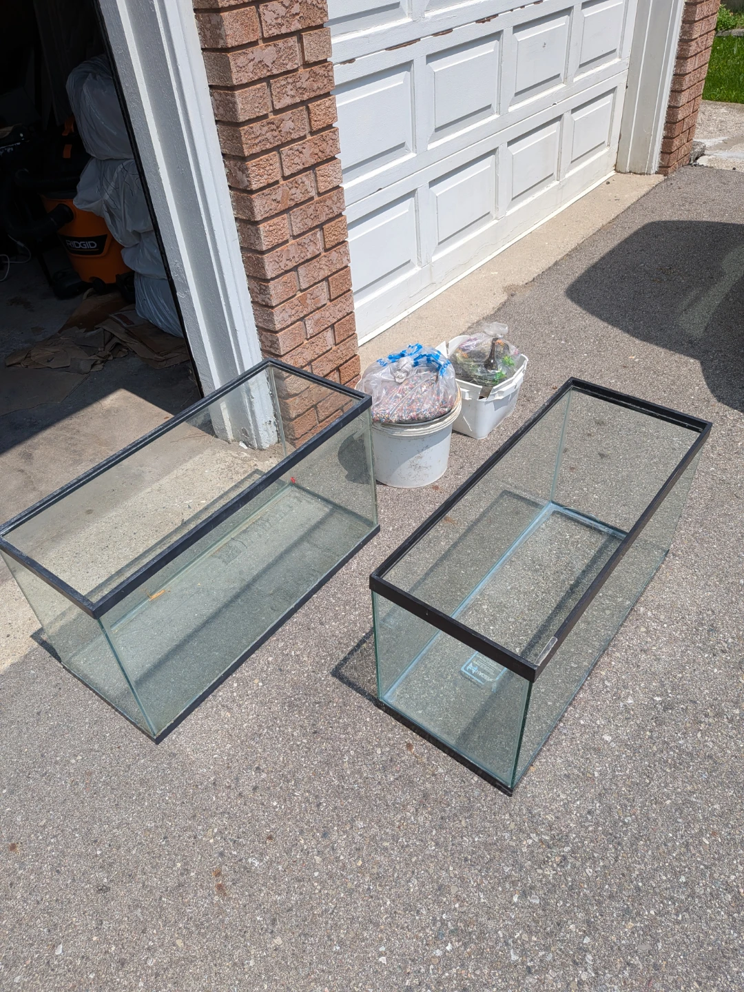 Two Glass Aquariums with Gravel and Decorations