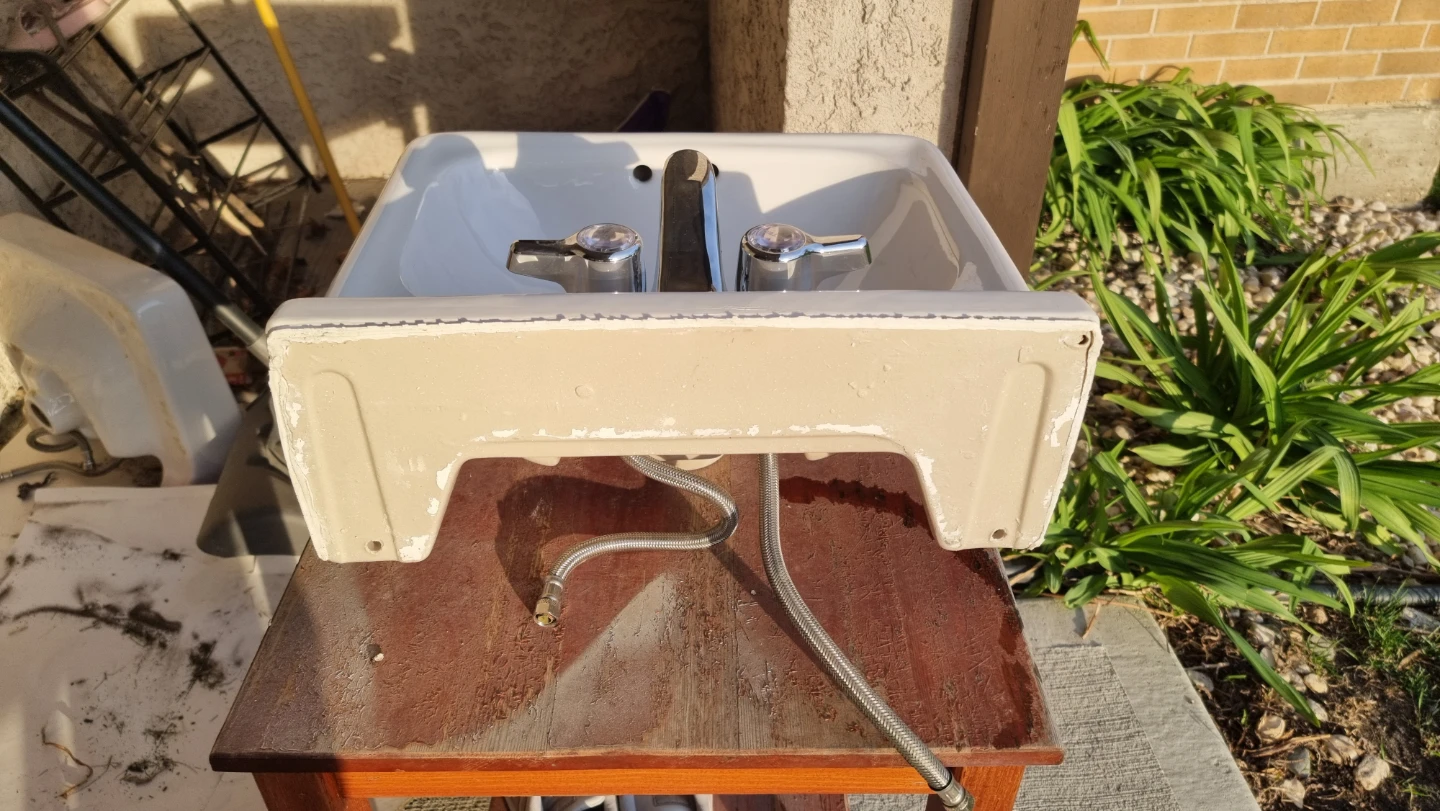 White Wall-Mounted Sink with Chrome Faucets - photo 2