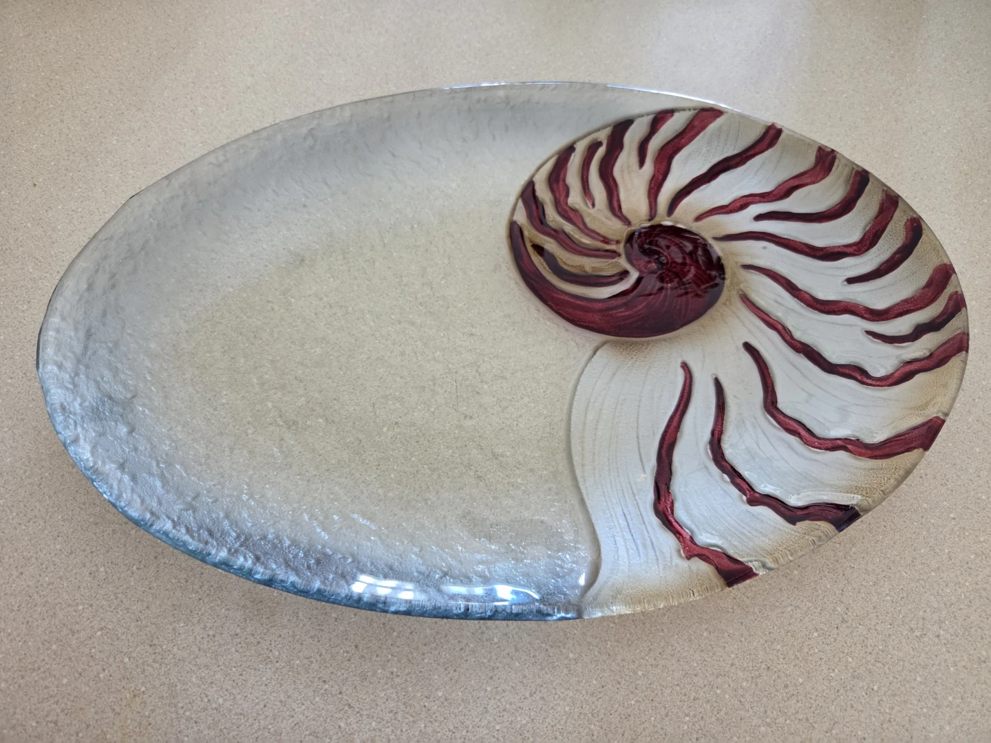 Glass shell plate