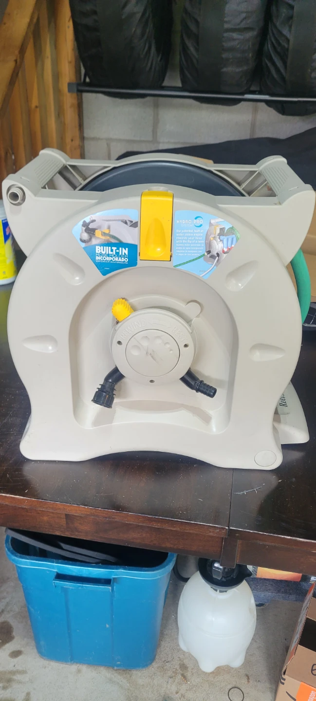 Automatic garden hose reel
