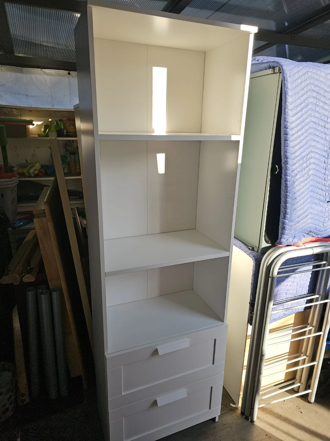 White shelf with drawers