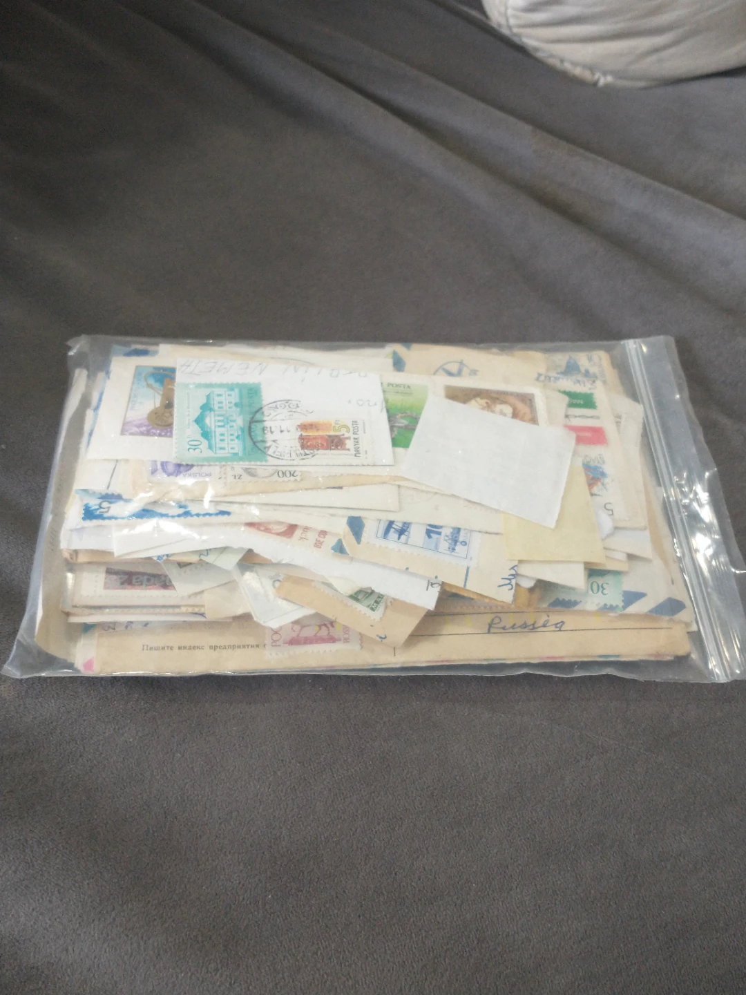 Lot 1 - over 300 world stamps on paper