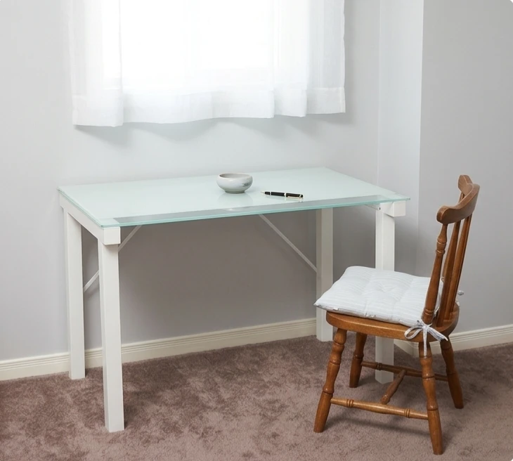 White frame glass top desk