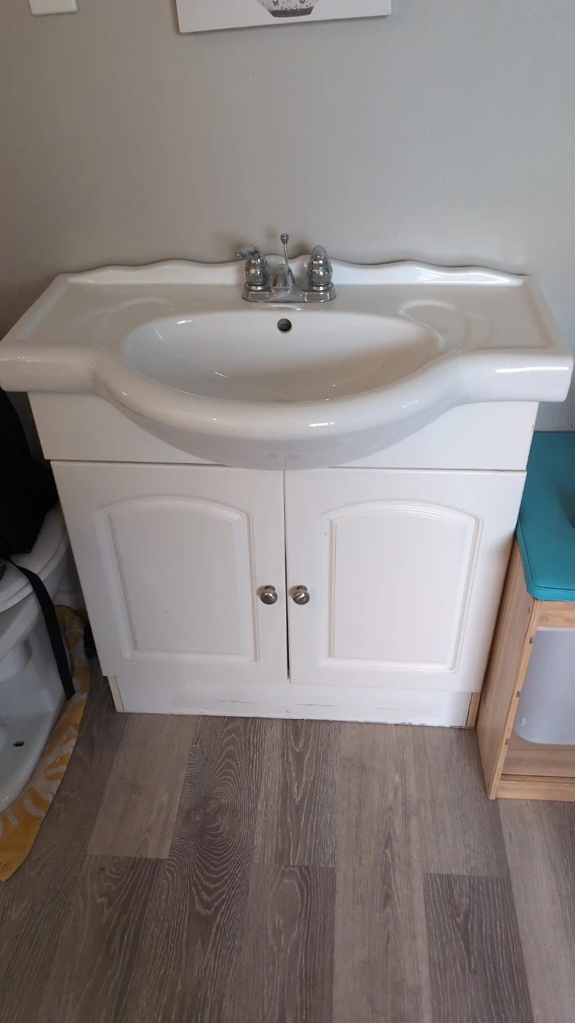 White Bathroom Vanity with Sink and Faucet