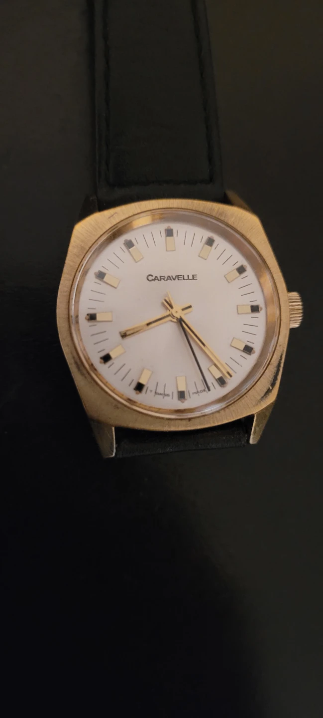 Caravelle Gold Tone Watch with Black Leather Strap