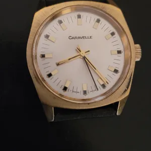 Caravelle Gold Tone Watch with Black Leather Strap