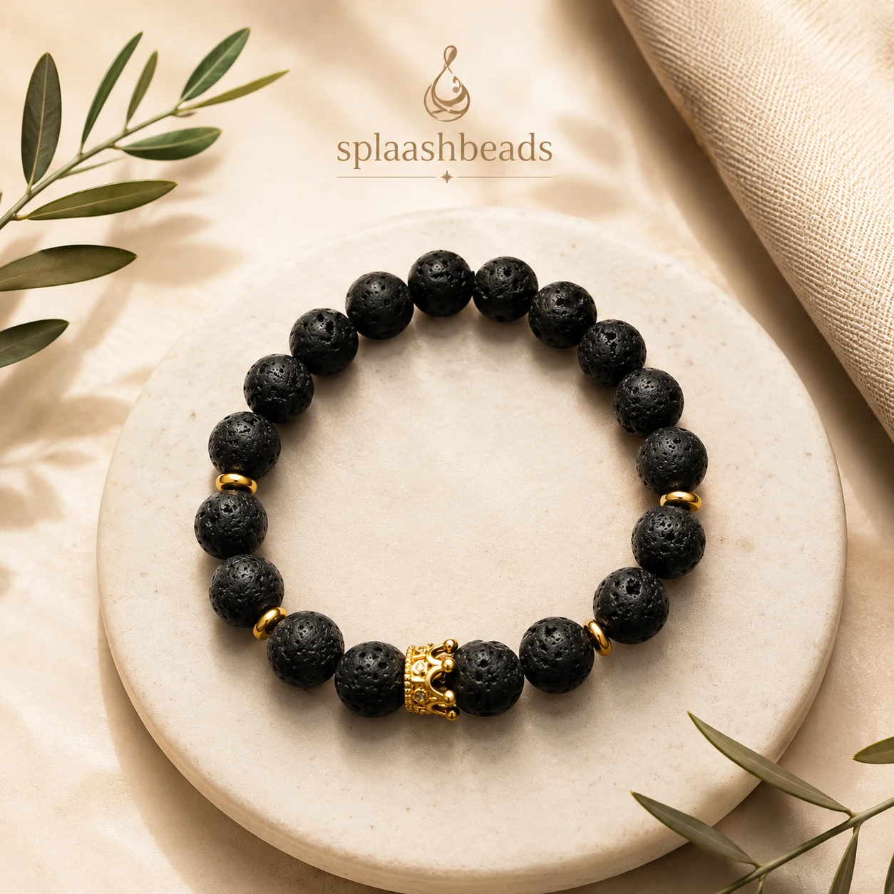 Splashbeads Lava Stone Bracelet with Crown Charm