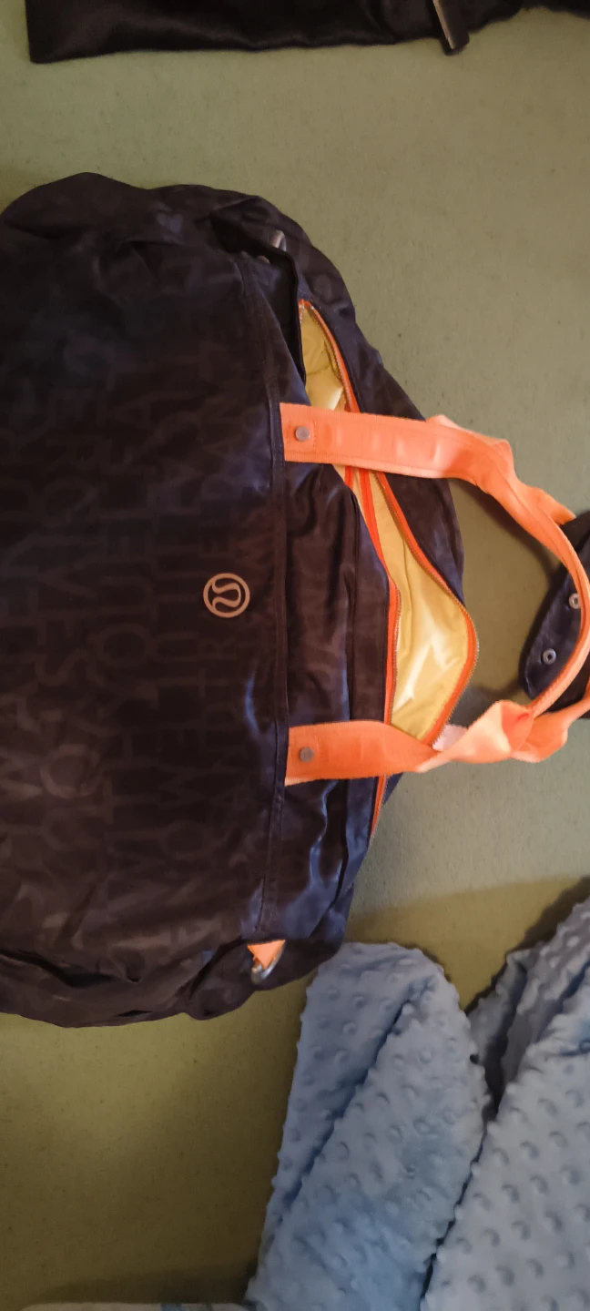Lululemon Duffel Bag - Dark with Orange Accents